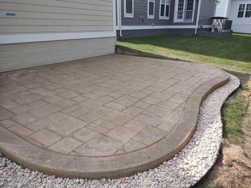A concrete patio with rounded form
